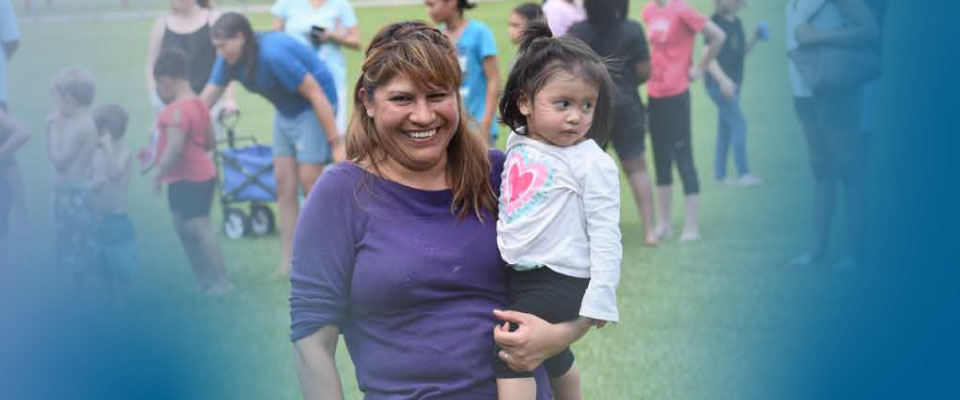 mom and daughter smiling